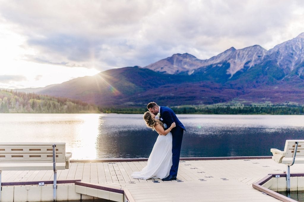 Bride and Groom Kissing at Sunset in jasper